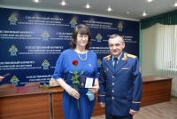 Доцент ЧИ БГУ Е.А. Скобина награждена памятной медалью Следственного комитета